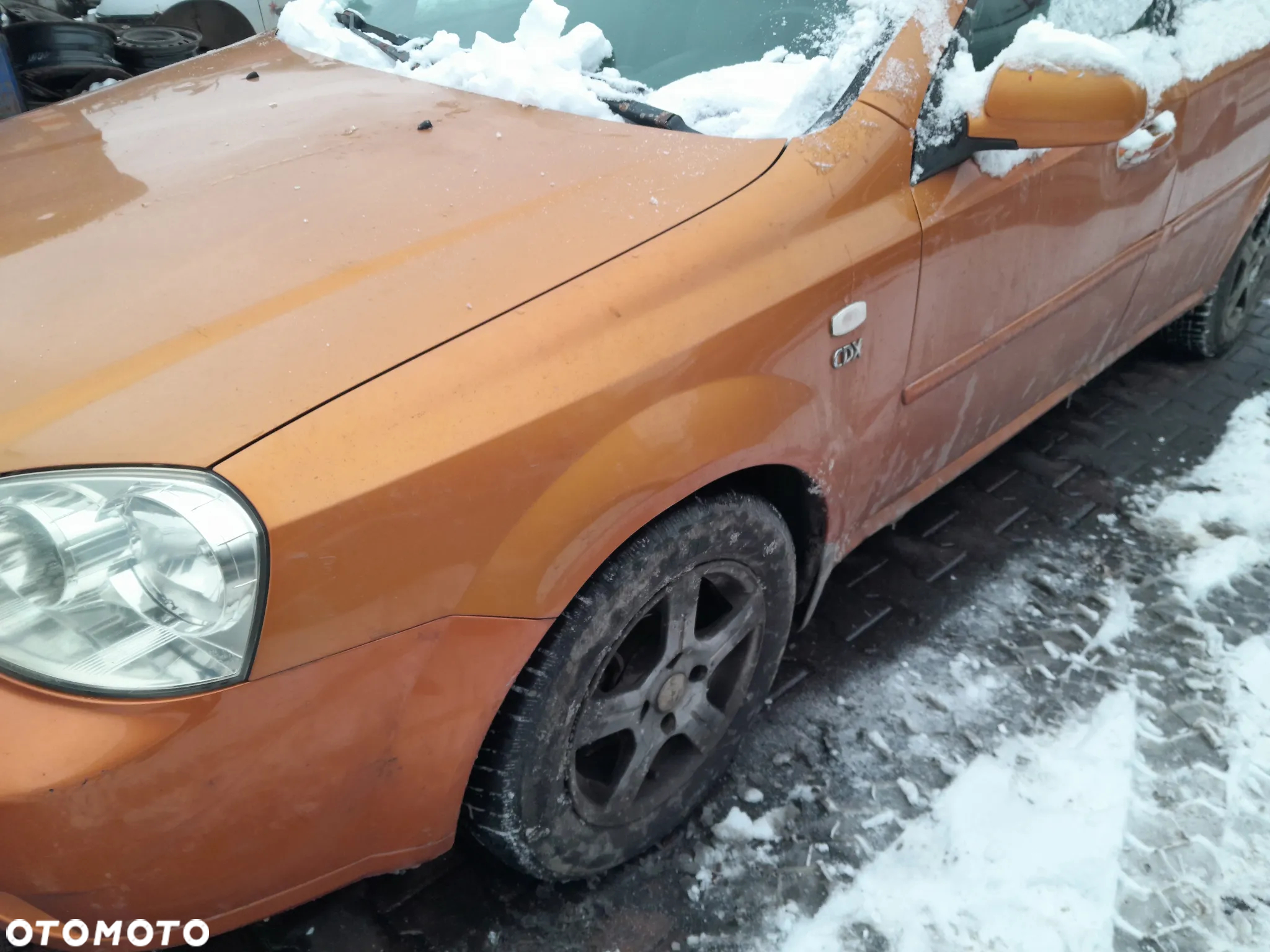 Błotnik przedni lewy Chevrolet Daewoo Nubira 02-12r. 54U - 2