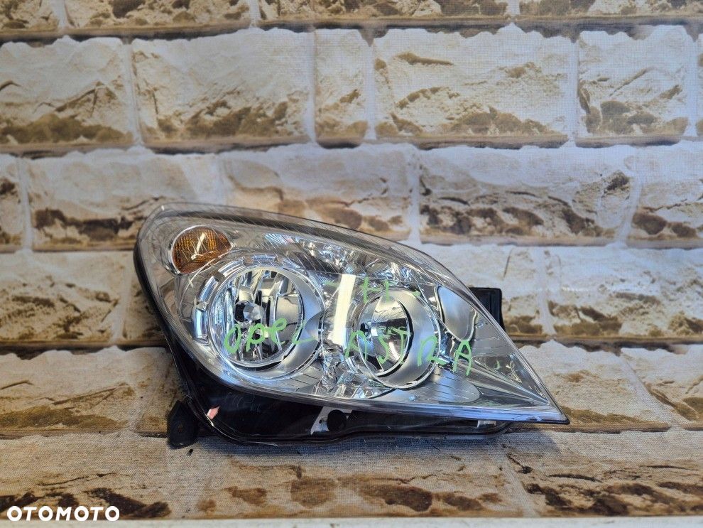 Reflektor Przód strona prawa Opel Astra H III lift 1EG27037042 - 2