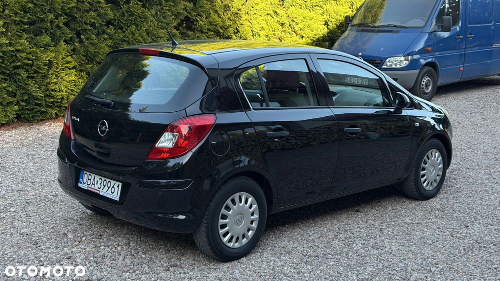 Opel Corsa 1.4 16V Active - 4