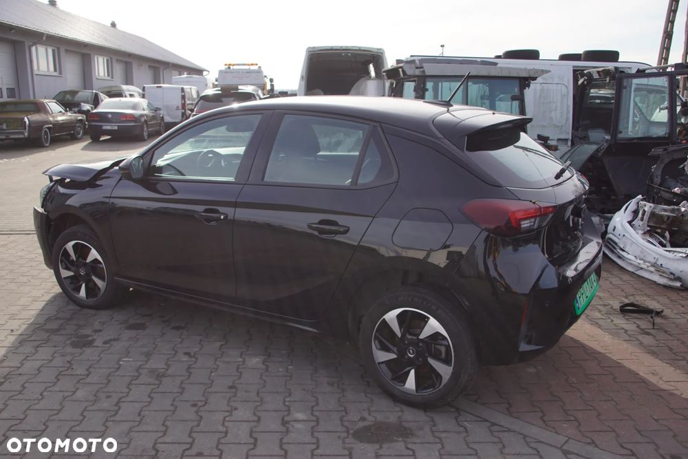 Auto na części - Opel Corsa-e F 100 kW KTV 2023R Falownik Inwerter Bateria Drzwi Klapa Błotnik Lusterko Zderzak Lampa Deska Kokpit Sterownik Moduł Czujnik Wyświetlacz Kierownica Panel - 6