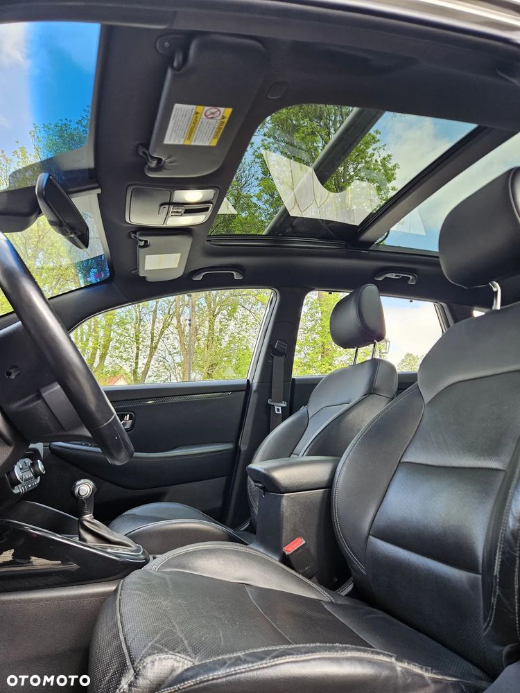 Kia Carens - 34