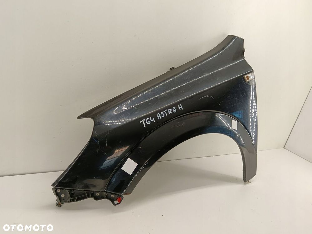 BŁOTNIK LEWY PRZEDNI OPEL ASTRA III H 04-09 - 2
