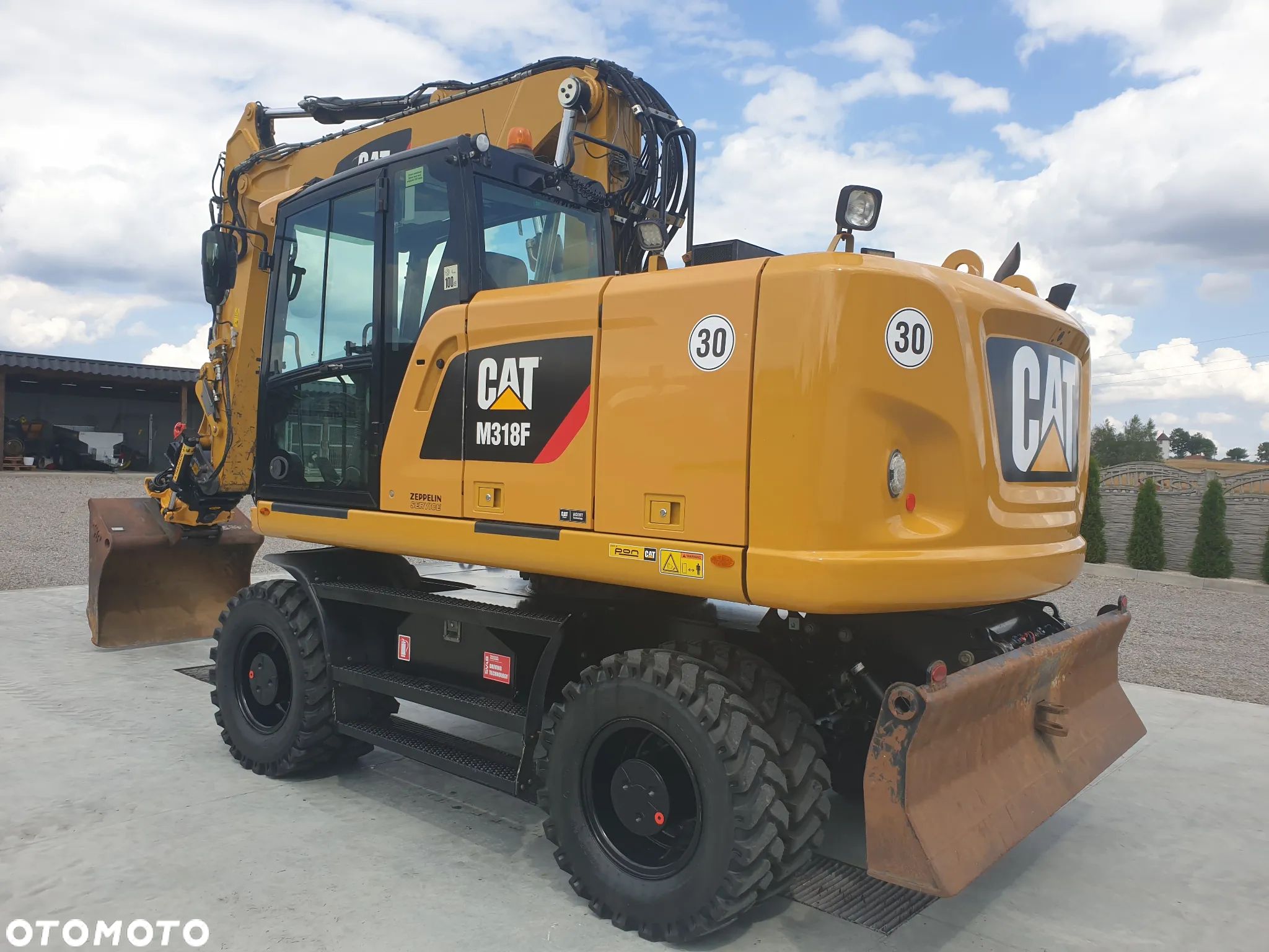 Caterpillar M 318 F ROTOTILT SPROWADZONY ŁADNY STAN - 1