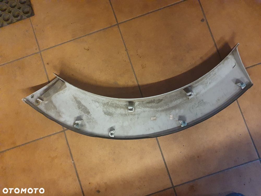 NAKŁADKA BŁOTNIKA MITSUBISHI PAJERO SPORT LEWA TYLNA 99-06 KOD A75 - 4