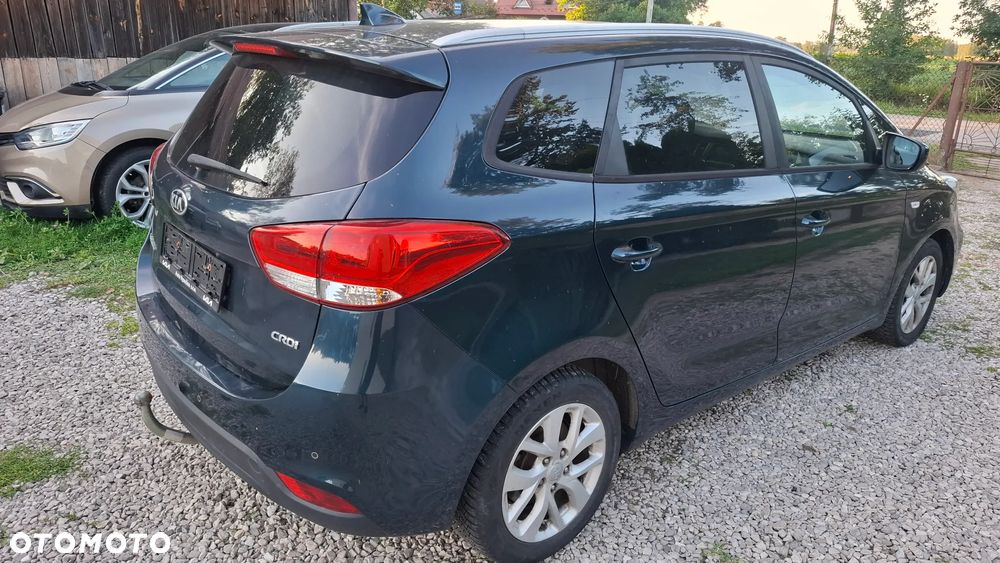 Kia Carens - 4