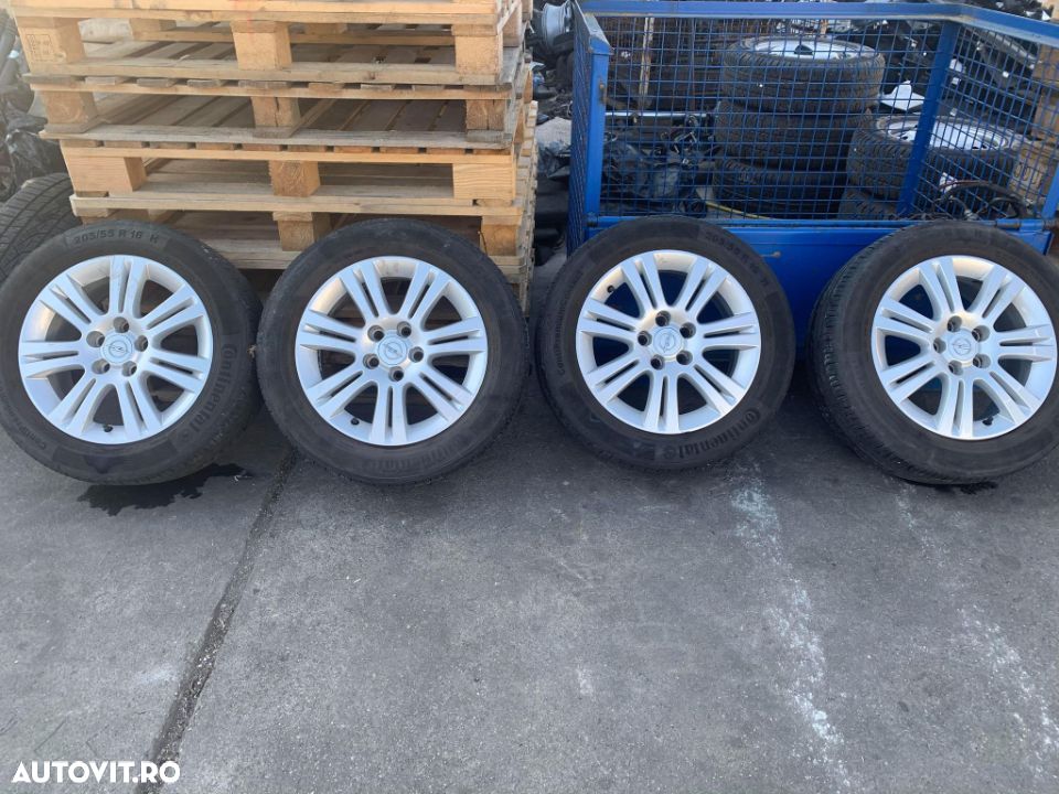 Set de jante cu cauciuc pentru Opel Astra H/Zafira B, 205/55R 16H, cod 0P026K7 - 1