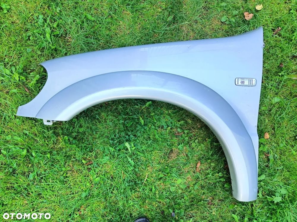 MERCEDES W163 ML BŁOTNIK AMG PRZEDNI PRZÓD LEWY 744 LISTWA POSZERZENIE