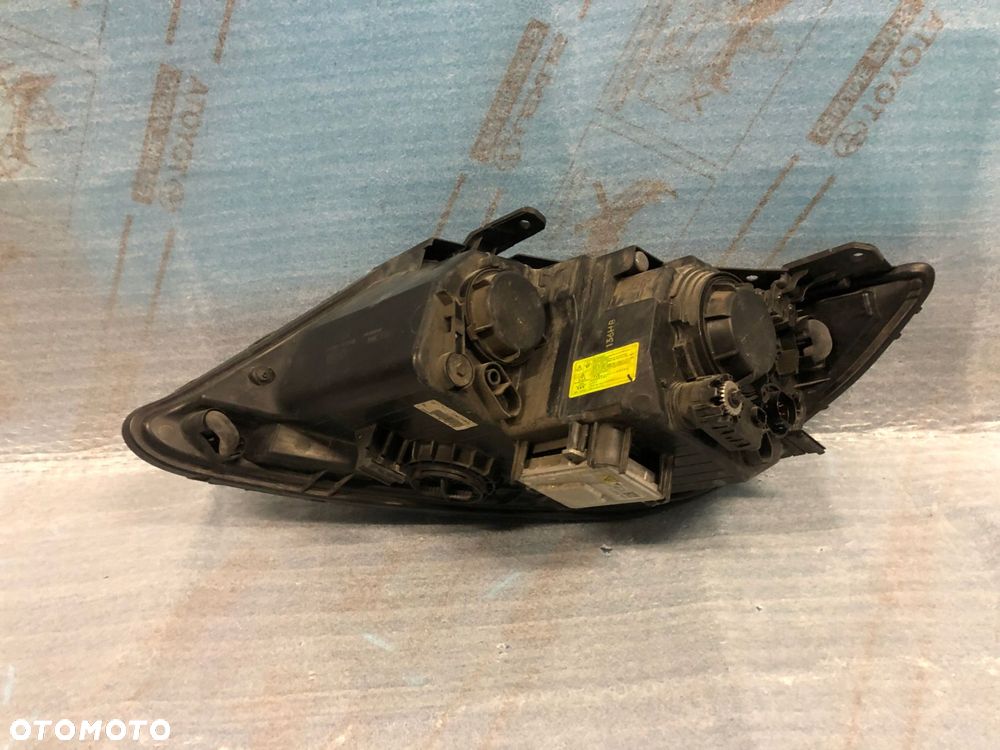 REFLEKTOR PRAWY KIA SORENTO II LIFT xenon KOMPLETNY nr.00 - 4