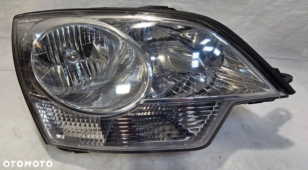 LAMPA PRZÓD PRAWA OPEL ANTARA UK ANGLIK 00024585 - 1
