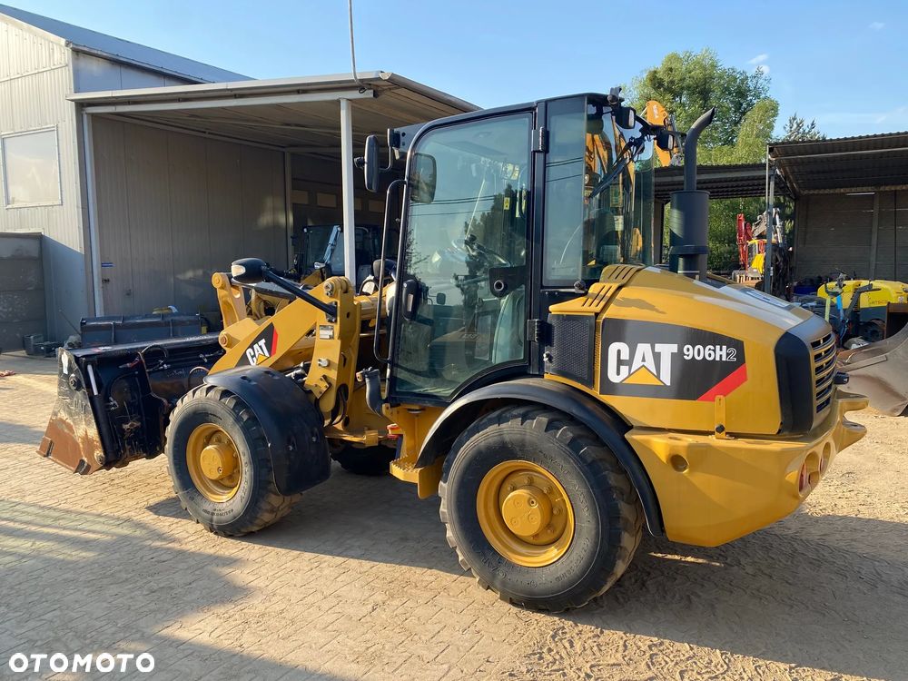 Caterpillar CAT 906H2, 2013 ROK, ŁYŻKA OTWIERANA + WIDŁY, z NIEMIEC, SUPER STAN, - 8