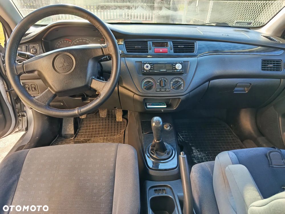 Mitsubishi Lancer 1.6 Comfort + - 5