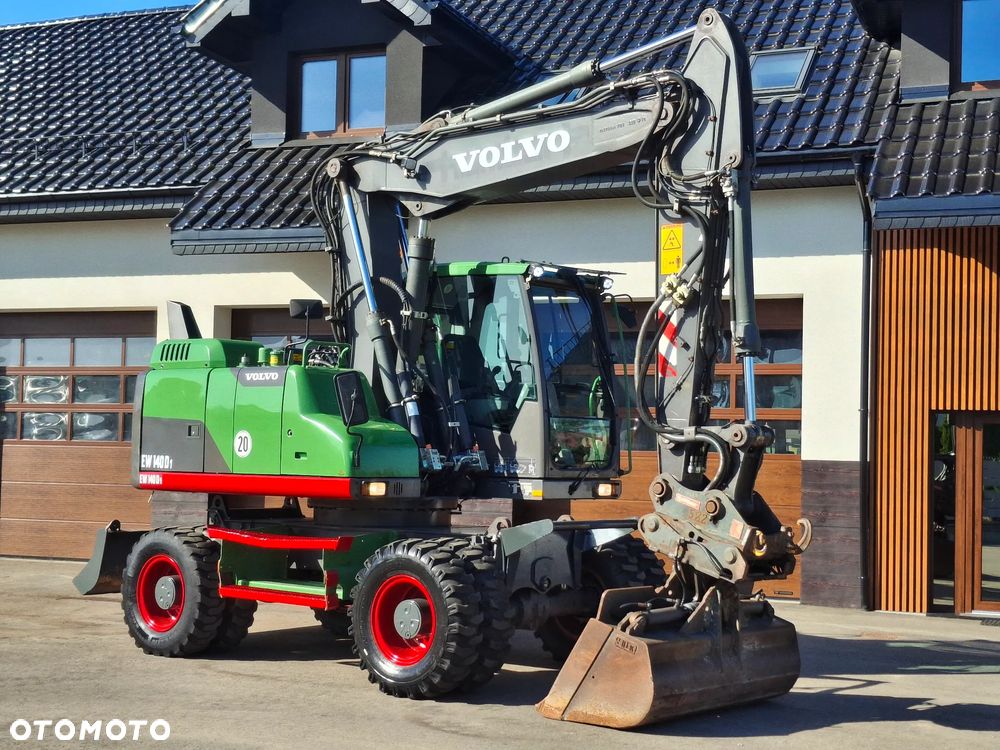 Volvo EW 140D Koparka Kołowa OilQuick Szybkozłącze Podwójne Koła 2015 Rok 2439 MTH Moc: 204 KM Dodatkowa Łyżka Pług Bardzo Dobry Stan Sprowadzona - 6