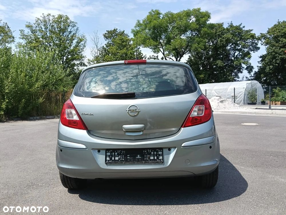 Opel Corsa 1.2 16V Cosmo - 9