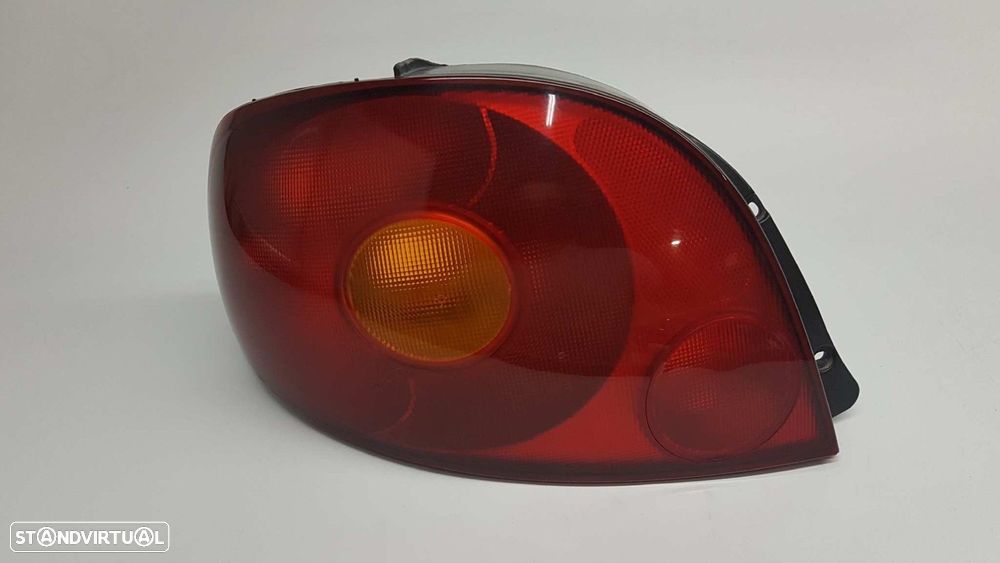 FAROLIM TRASEIRO ESQUERDO DAEWOO MATIZ CD - 1