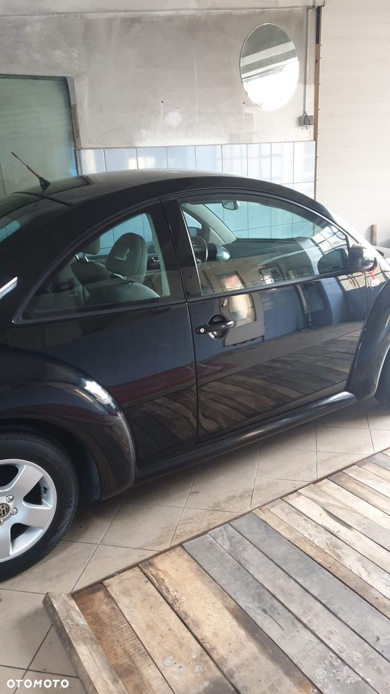 Volkswagen New Beetle 2.0 - 4