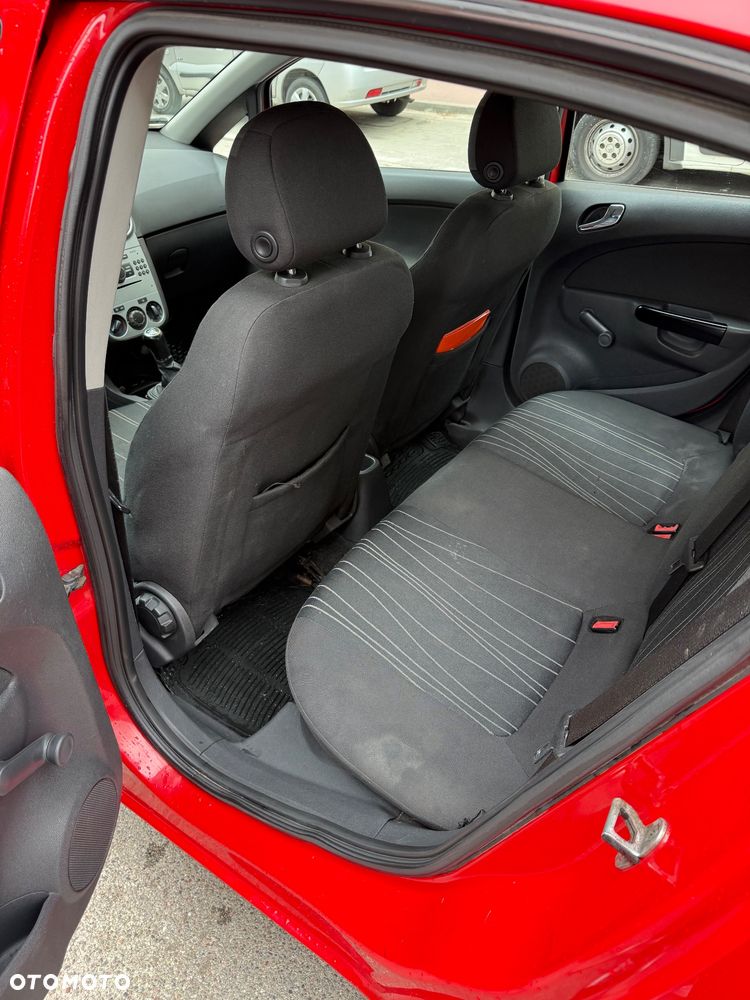 Opel Corsa 1.4 16V Cosmo - 11