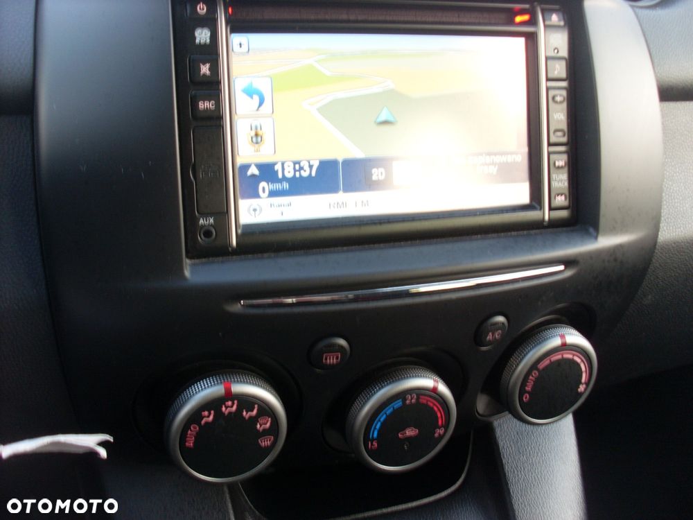 Mazda 2 1.3 Navi + - 12