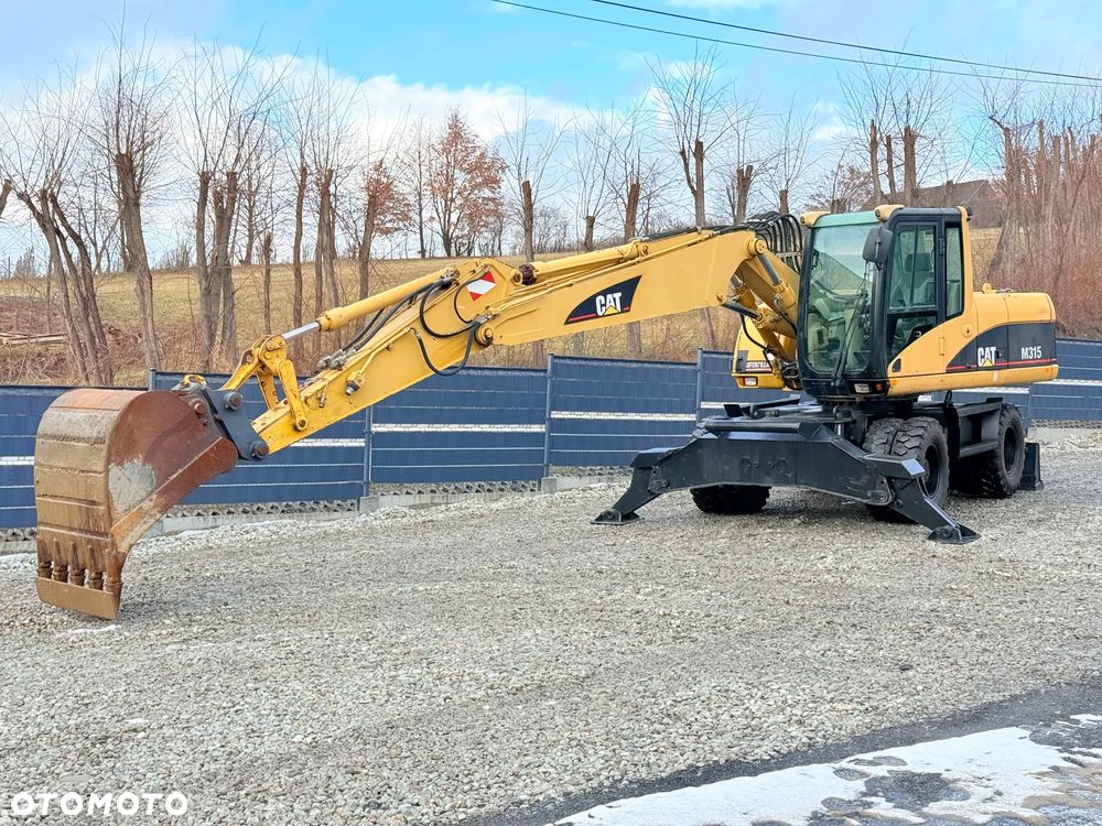 Caterpillar CAT M315C  CATERPILLAR SPROWADZONY  Bardzo Dobry Stan - 15