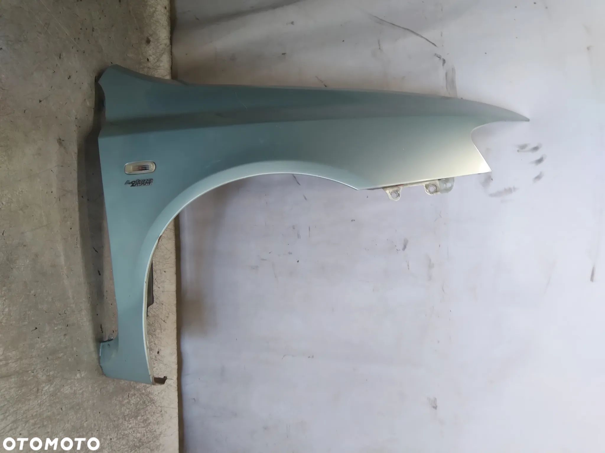BŁOTNIK PRAWY DO FIAT STILO 5D 5 DRZWI 745 BŁEKITNY - 1