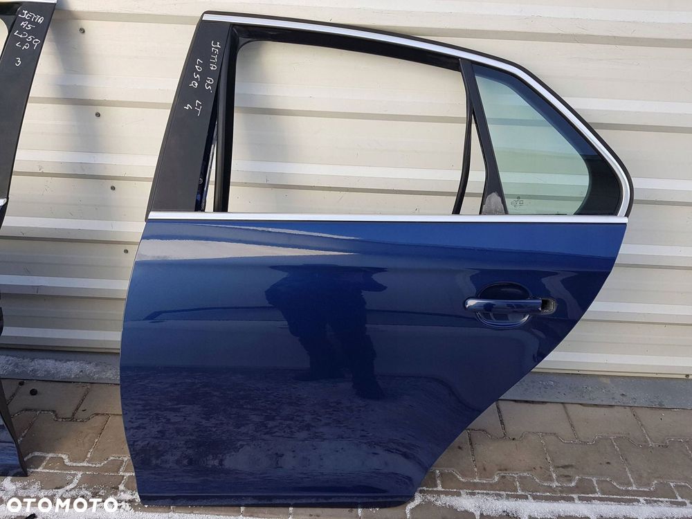 VW JETTA V 05-10r DRZWI LEWE TYŁ TYLNE LD5Q