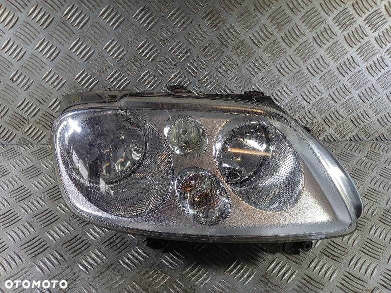 LAMPA PRAWA PRZEDNIA VOLKSWAGEN TOURAN - 1