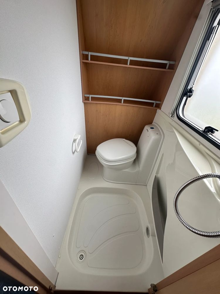 KNAUS 500 SUDWIND z napędem, markizą i łóżkami piętrowymi- 6os. - 39