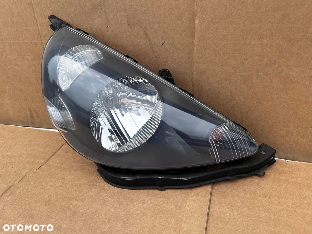 HONDA JAZZ LAMPA PRZEDNIA PRAWA REFLEKTOR PRZÓD PRAWY ORYGINALNY EUROPA