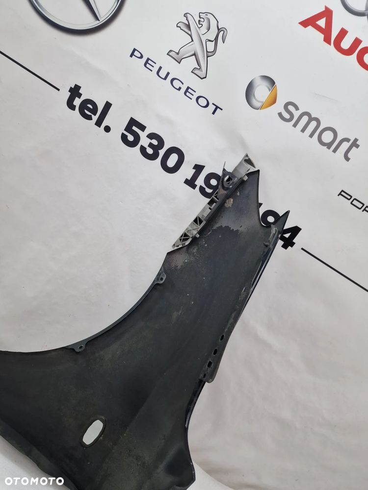 MAZDA 2 03-07 PRAWY BŁOTNIK PRZEDNI PRZÓD , NR AUKCJI BŁ215 - 17