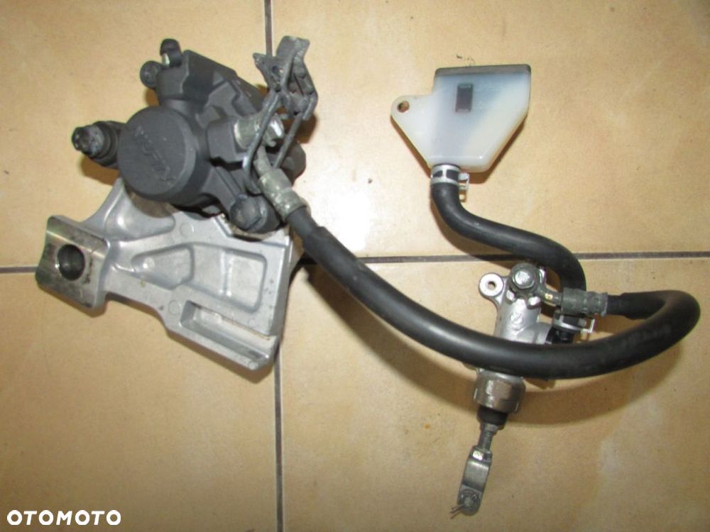 Suzuki SV 650 03-09 zacisk pompy hamulcowej tył - 1