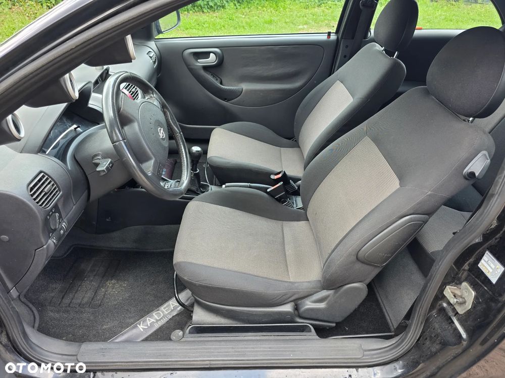 Opel Corsa 1.8 16V Sport - 11