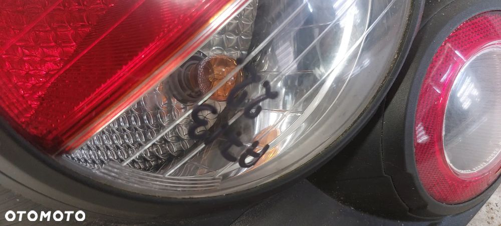 .  TYL TYLNA LAMPA LEWA CHEVROLET AVEO T300 - 2