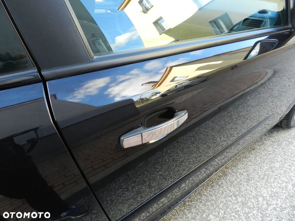 Opel Astra III GTC 1.4 Cosmo - 14