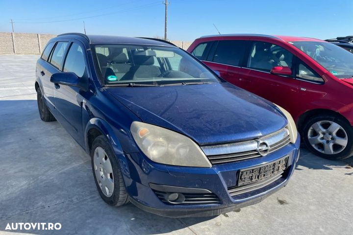 Usa spate stanga Opel Astra H  [din 2004 pana  2007] seria wagon 1.9 CDTI MT (100 hp) - 2
