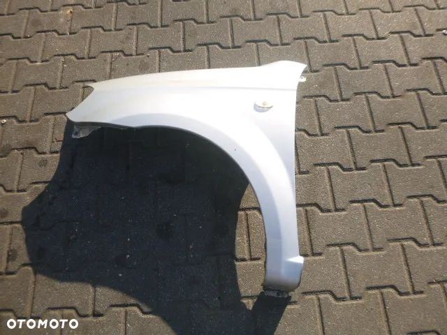 BŁOTNIK LEWY PRZÓD LEWY PRZEDNI CHEVROLET AVEO II T250 07-11 - 2