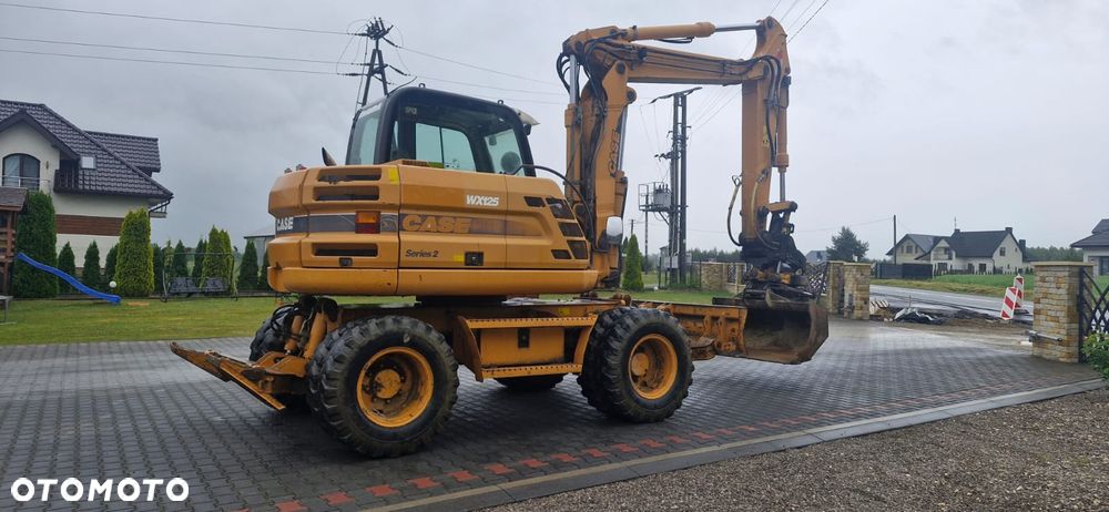 Case WX125/ Rototilit Engcon/ Maszyna sprowadzona/ - 12