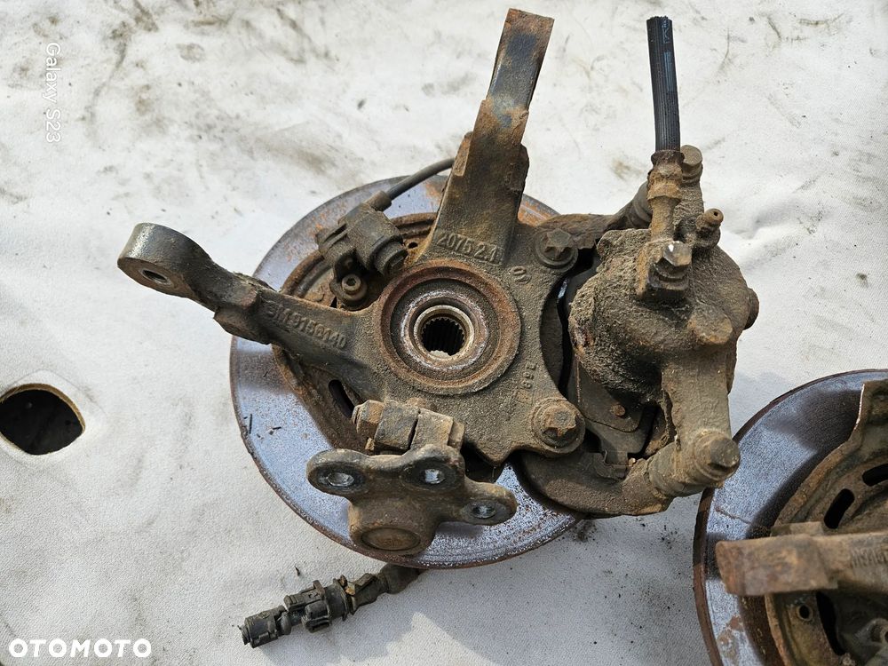 Zwrotnica piasta lewa prawa przód przednia zacisk jarzmo tarcza czujnik ABS Opel Corsa C 1,0 12V 9156140 9156141 - 5