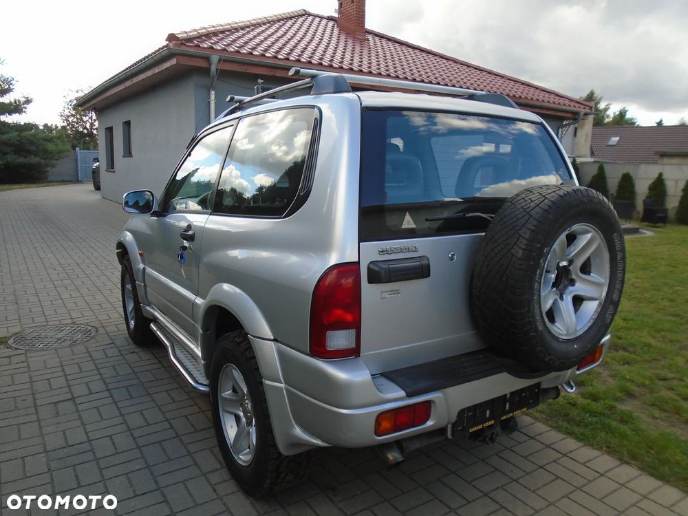 Suzuki Grand Vitara 2.0 - 7