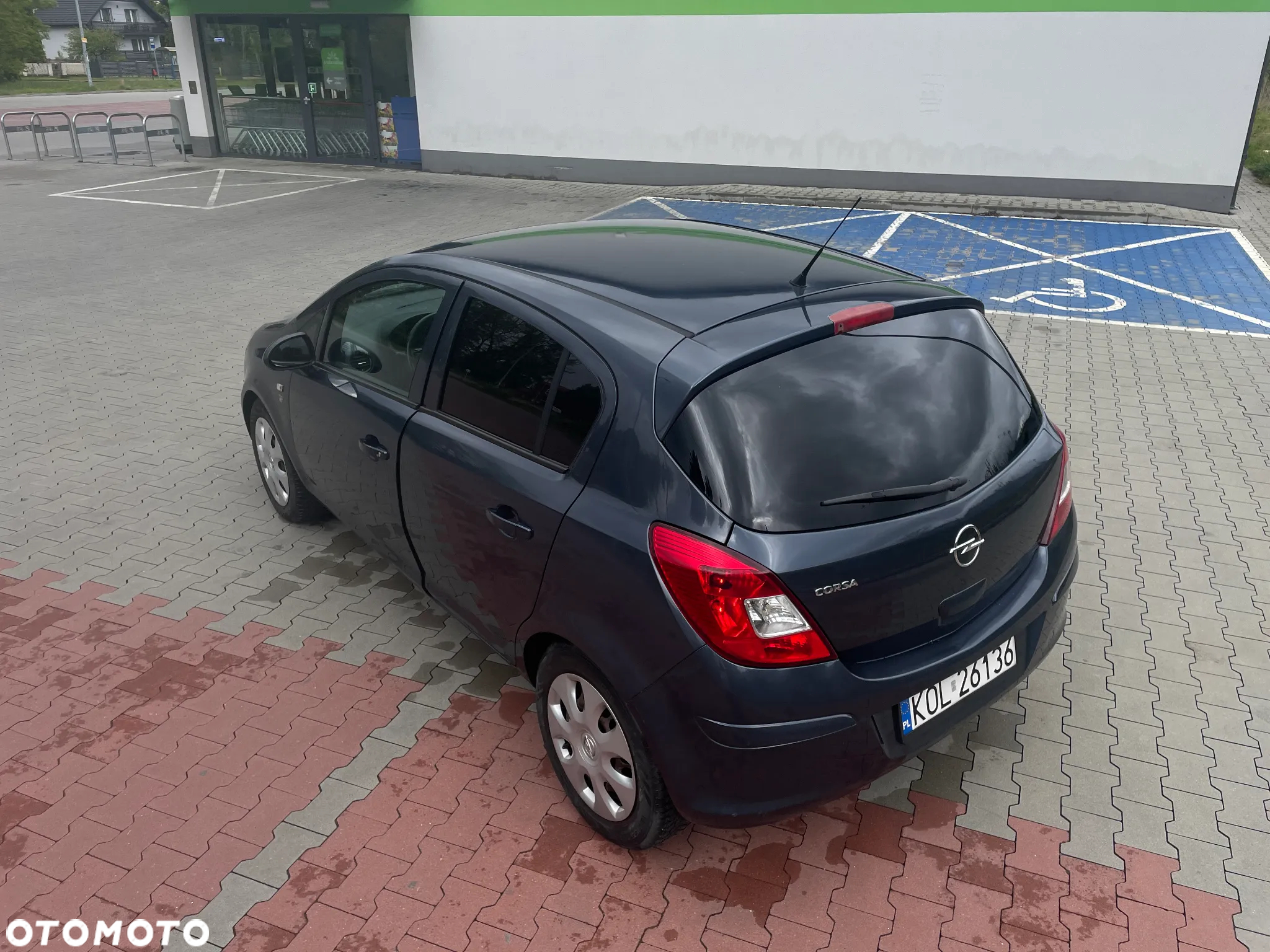 Opel Corsa 1.2 16V Enjoy - 10