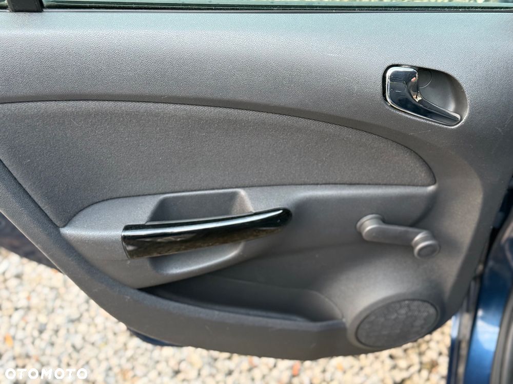 Opel Corsa 1.4 16V Active - 27