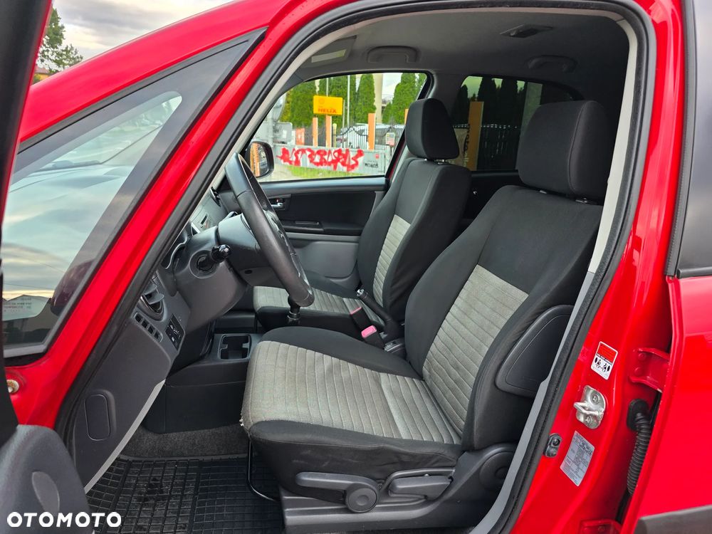 Suzuki SX4 1.6 Comfort Plus - 11