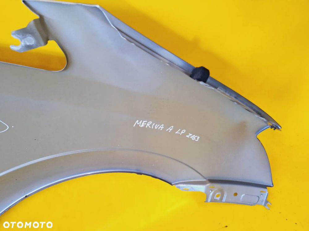 BŁOTNIK LEWY PRZÓD PRZEDNI OPEL MERIVA A LAK: Z163 NR649 - 12