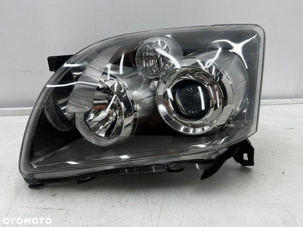 Lampa reflektor Toyota Avensis 2 II T25 LIFT 06-09r. lewa przednia EU H7 soczewka lewy przód 81170-0 - 1