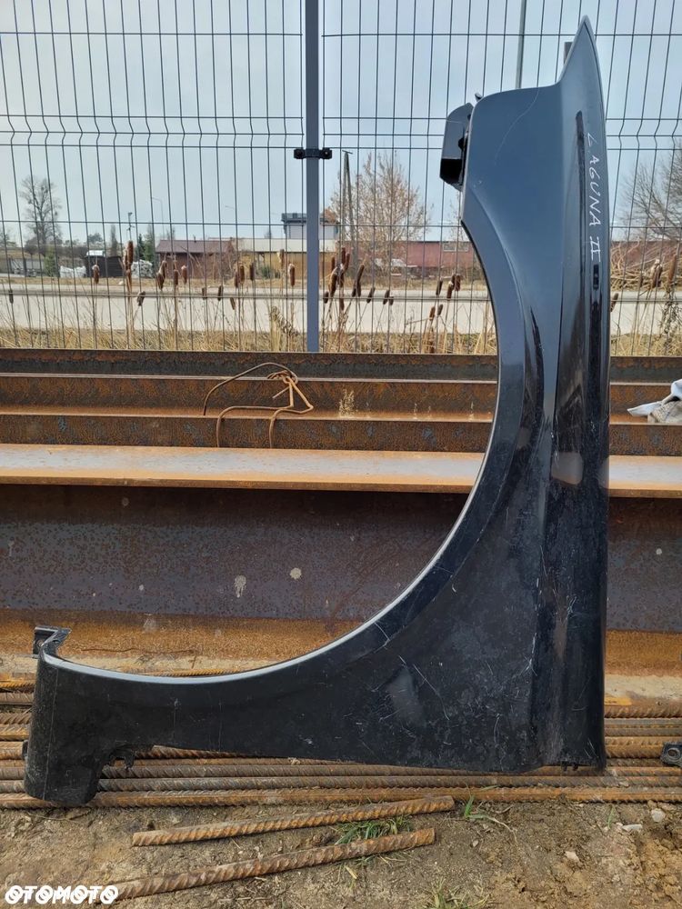 BŁOTNIK LAGUNA II PRAWY LEWY PRZÓD - 11