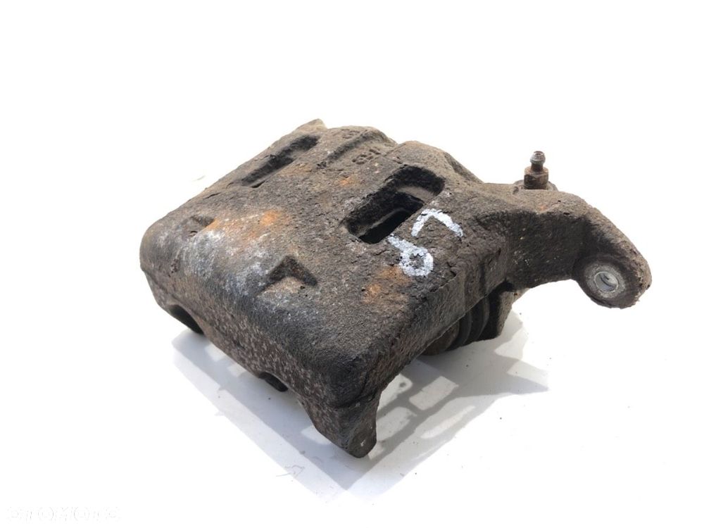 ZACISK LEWY PRZÓD  NISSAN QASHQAI / QASHQAI +2 I (J10, NJ10, JJ10E) 2006 - 2014 2.0 Napęd na - 1