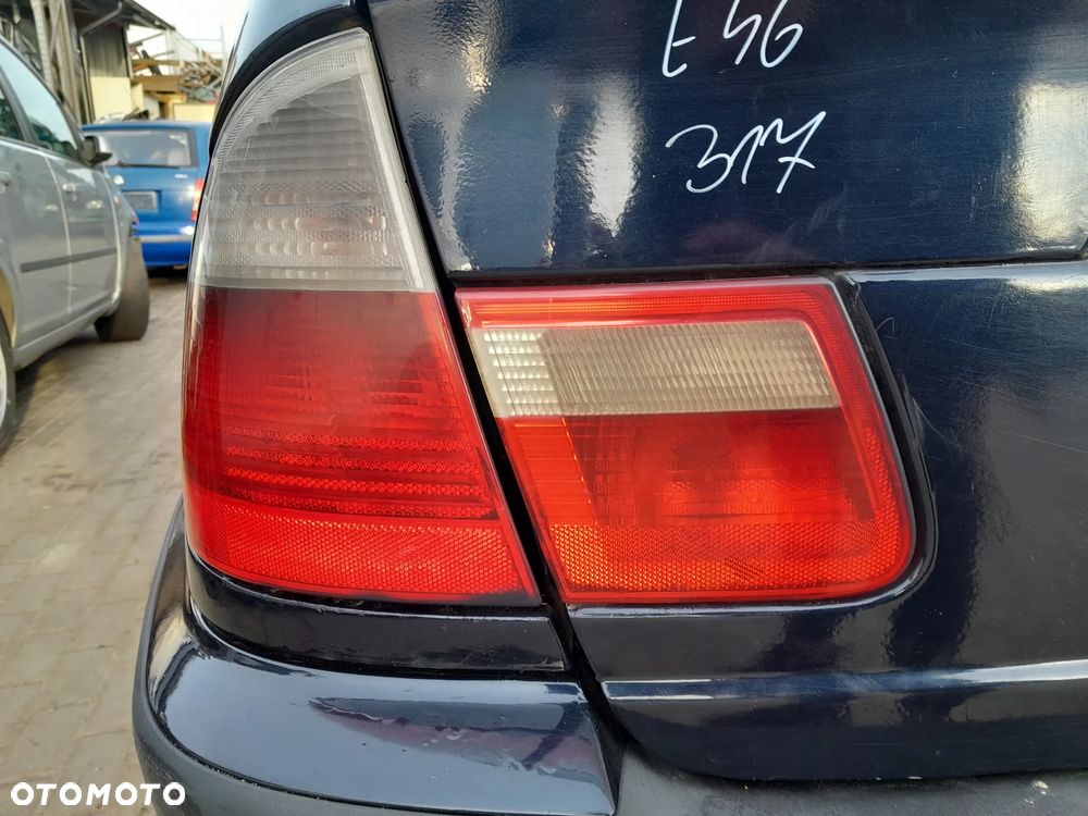 BMW E46 LIFT LAMPA TYLNA LEWA W KLAPE - 1