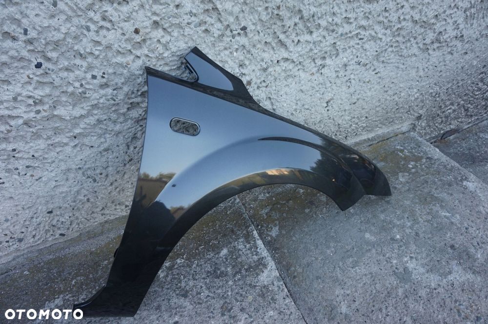 BŁOTNIK PRAWY FORD FOCUS II MK2 04/08r K1 - 3