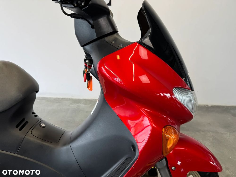 Suzuki Inny - 12