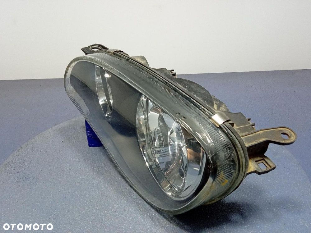 TOYOTA COROLLA E11 LIFT 99-02 REFLEKTOR LEWY LAMPA EU 20-5954 - 2