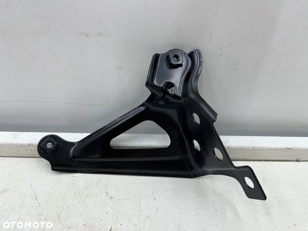 Mocowanie błotnika Toyota Corolla E21 18r.- lewe przednie wspornik podpora 53836-02040 - 2
