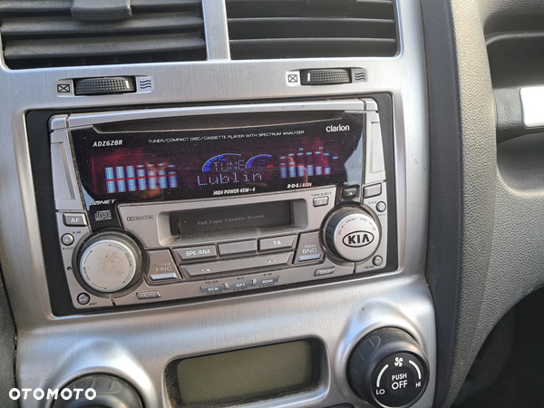 radio SPORTAGE II,CARENS III,04-10